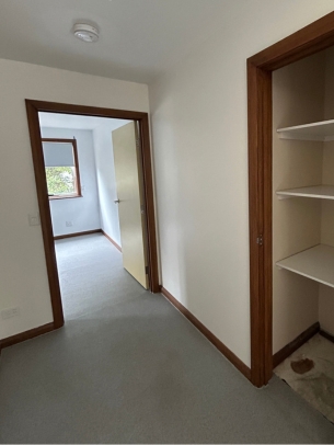 Additional storage is available in a large linen cupboard, located in one of the extra-wide hallways. 